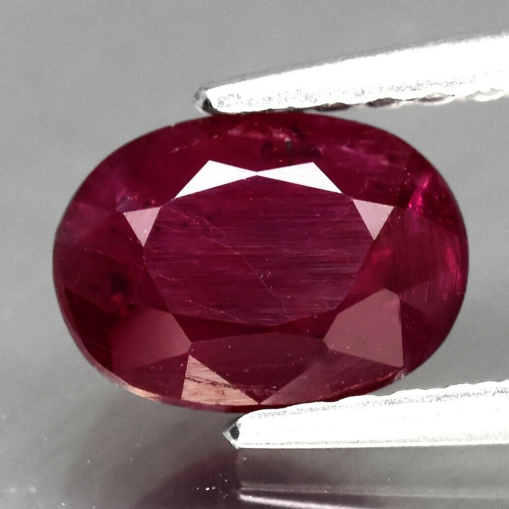 1.29ct 7x5mm Oval Natural Purplish Red Ruby Mozambique *Heated